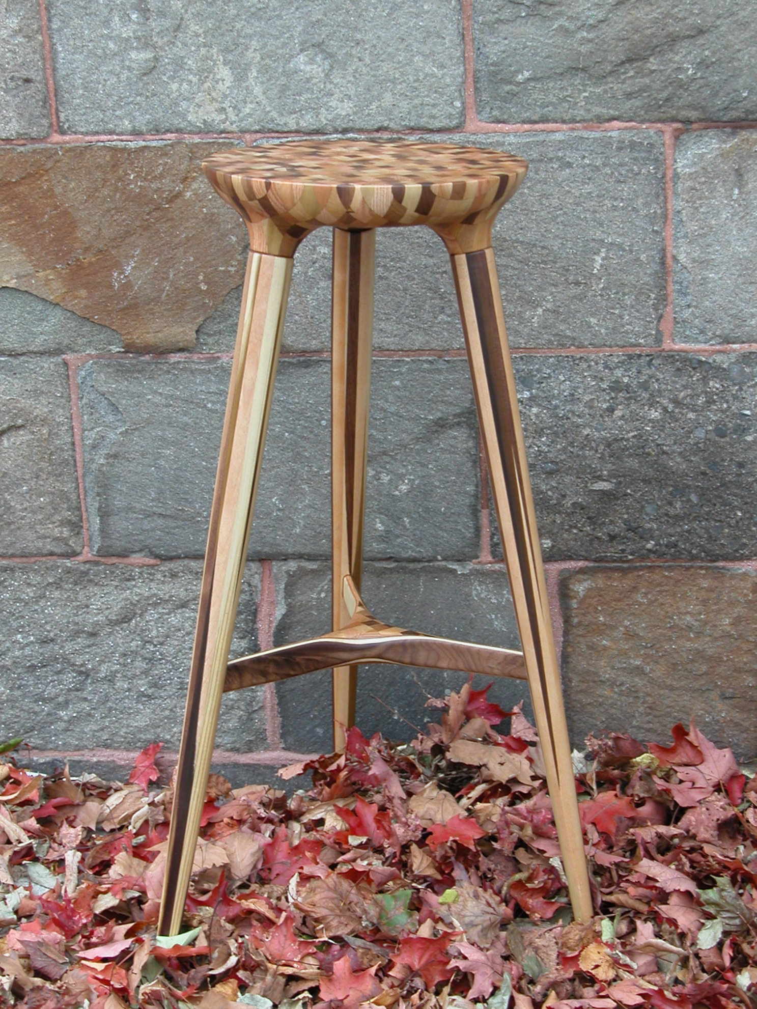 I built this custom stool out of entirely reclaimed scrap pieces from the studio\'s other products. 