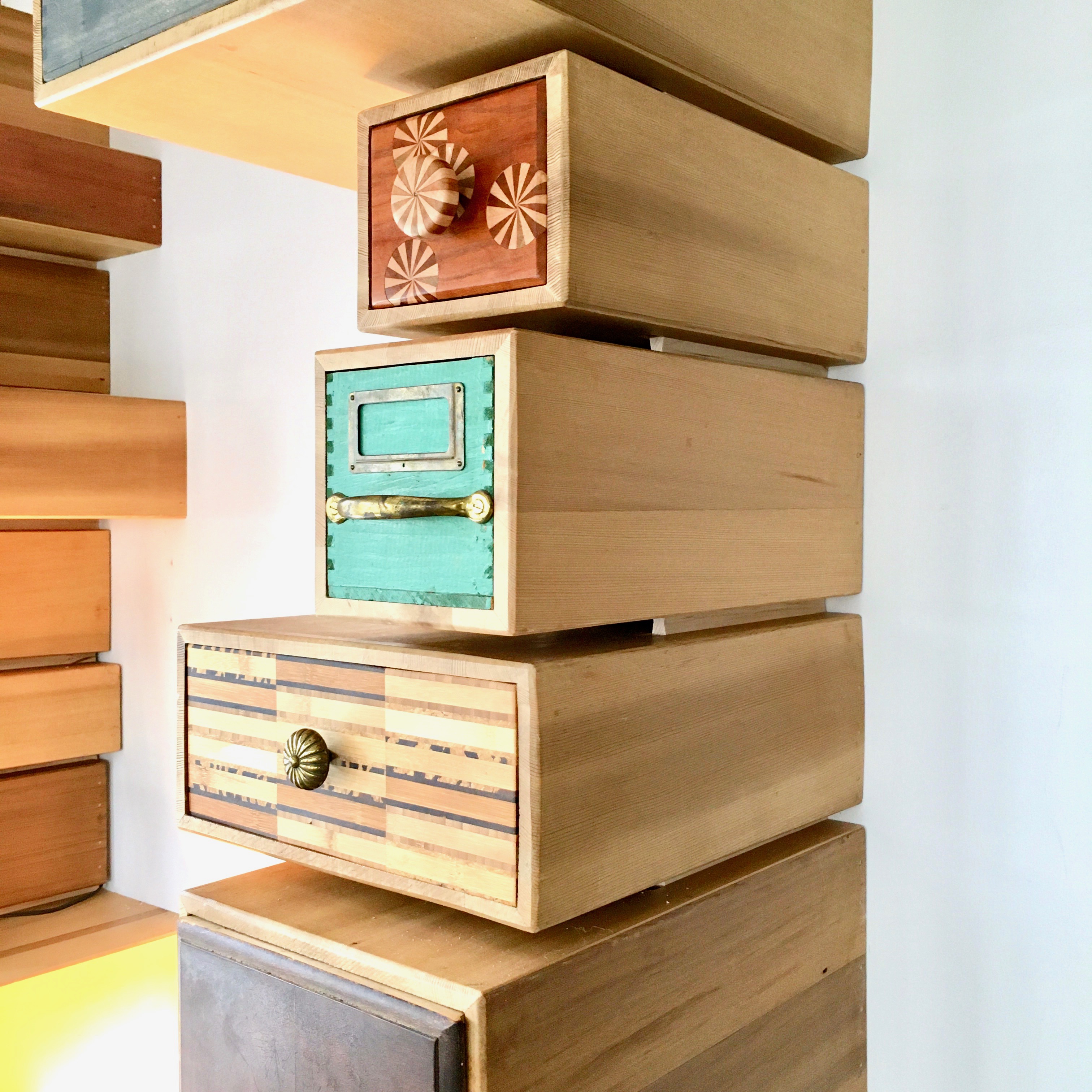 Chest of Lost Drawers is an assortment of mismatched drawers collected over approximately a year. The boxes are made from re-claimed red cedar fencing offset from each-other with sliding dovetails