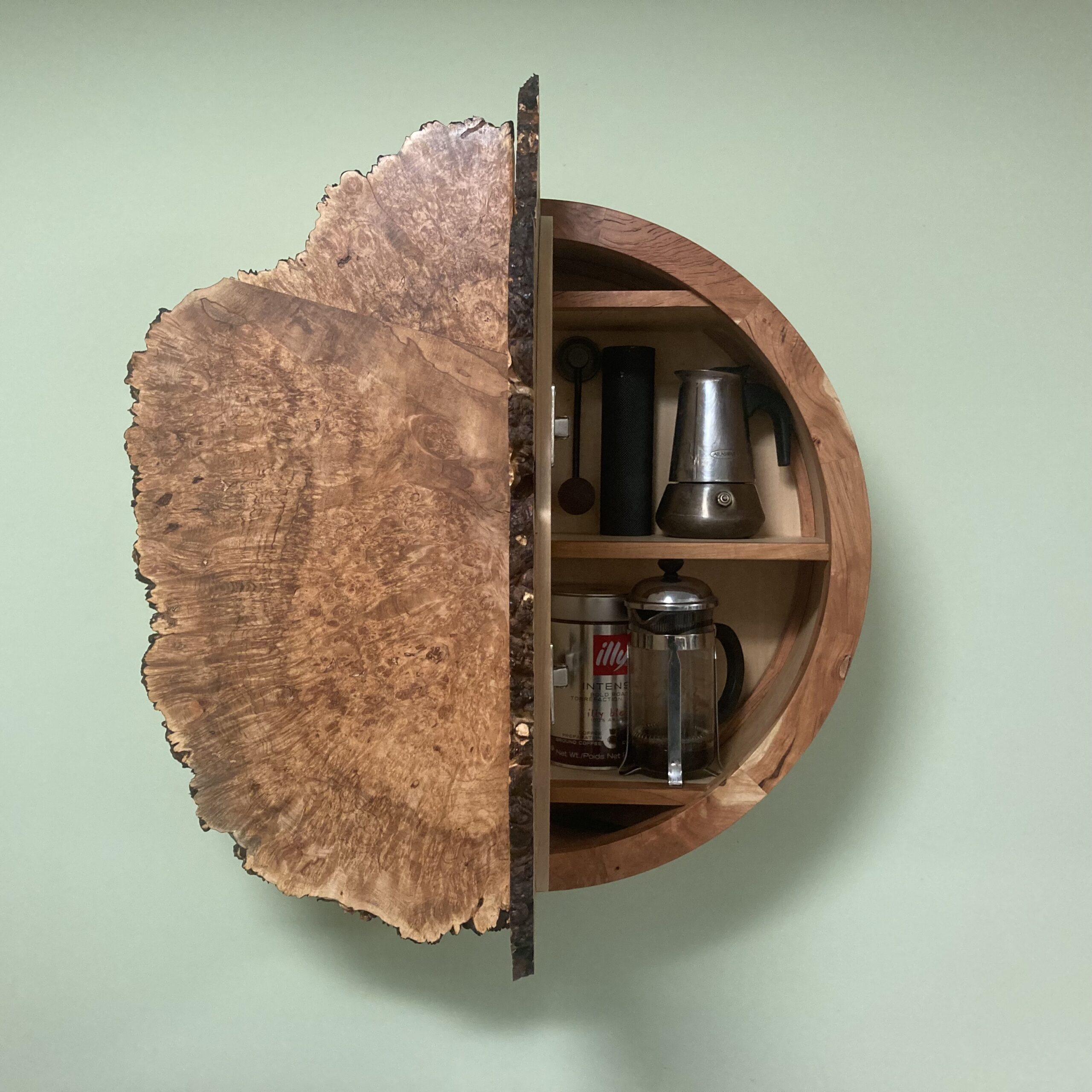 I made this cabinet to hold coffee and tea. The doors are a maple burl cut from a fallen tree in Brookline.