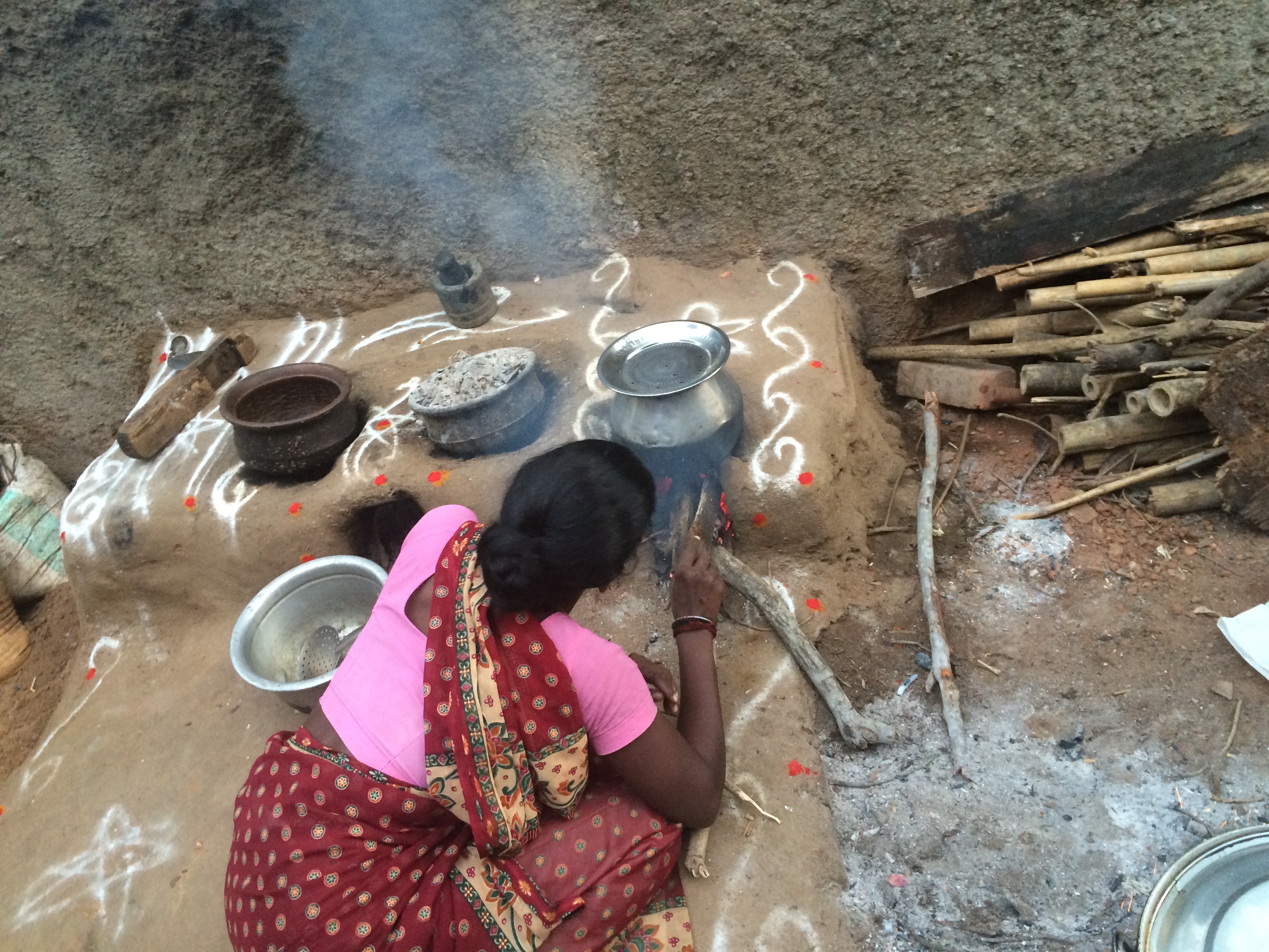 The vast majority of wood-burning cooking stoves in India are built into the kitchen or cooking area but this is not the way most improved cookstoves are built. This was the basis for the design direction of a built in stove for Prakti.