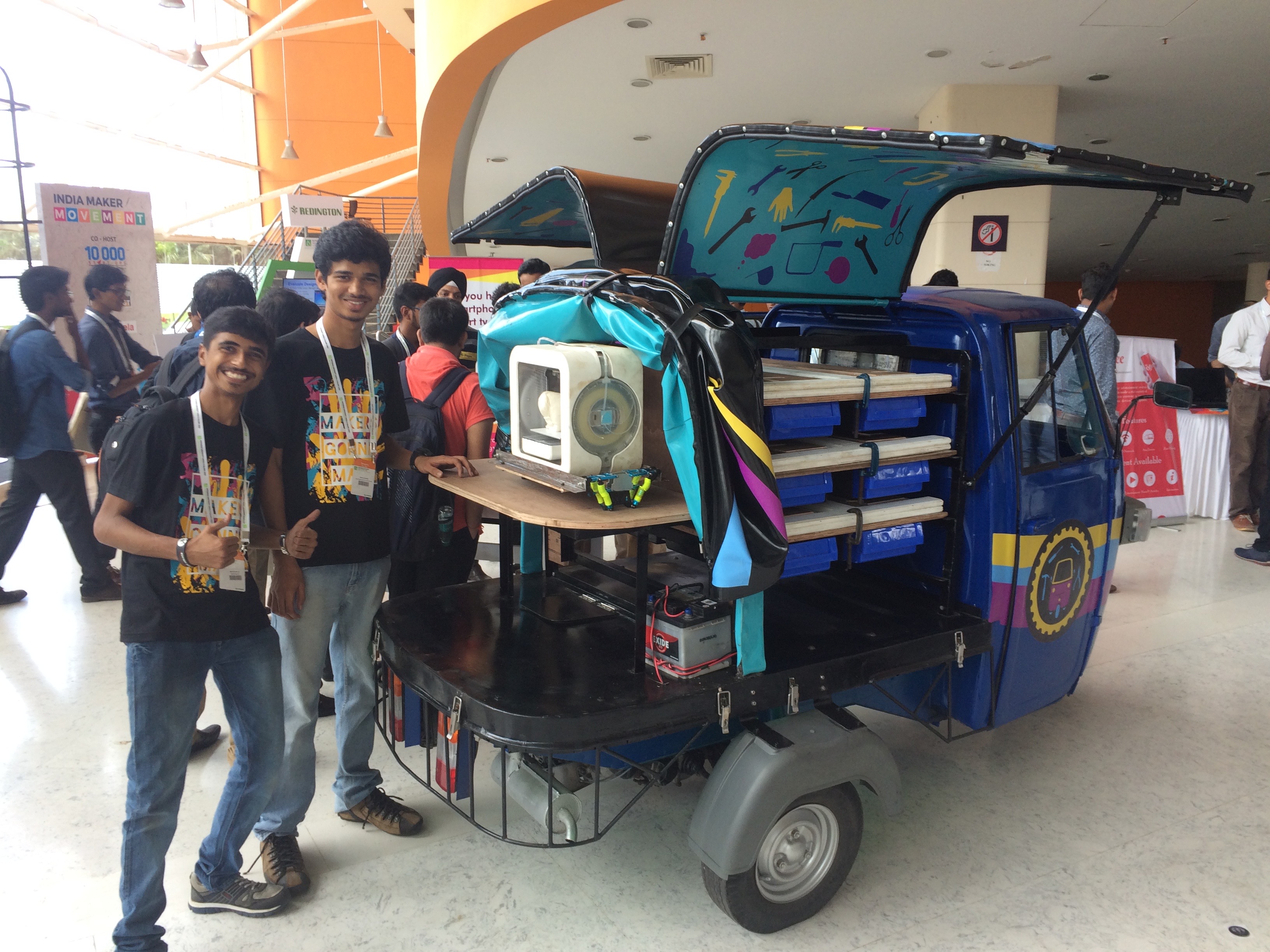 The Maker Auto on display at the 2016 Autodesk University conference with our build team champions Mayur and Nikhil